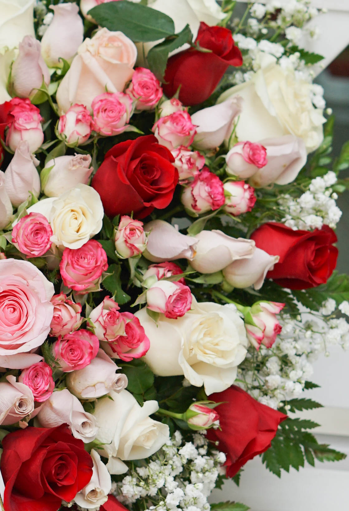 Corazón funerario rosas multicolor con envio a tanatorio en valencia
